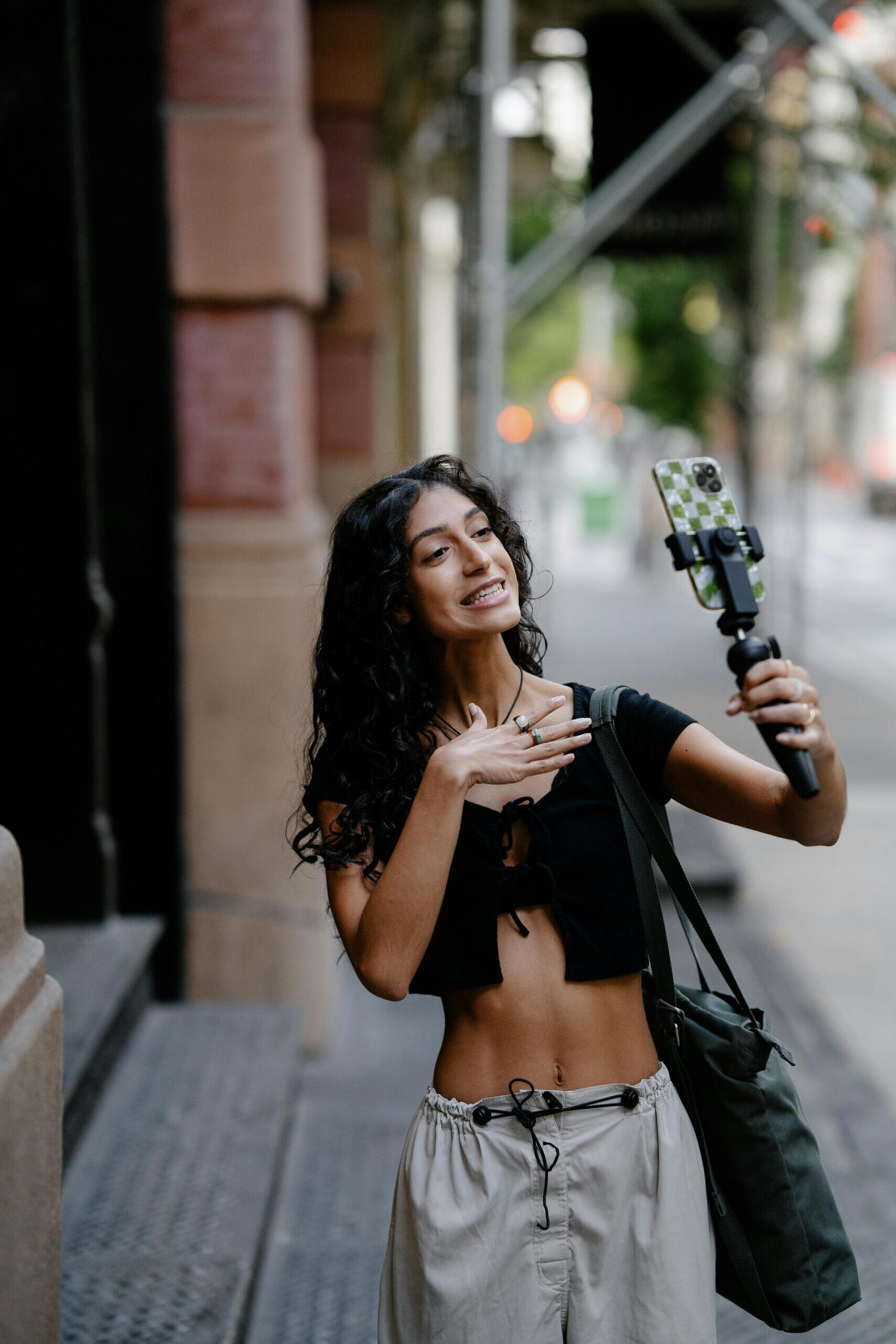 Influencer campaign case studies – woman creating social media content with smartphone